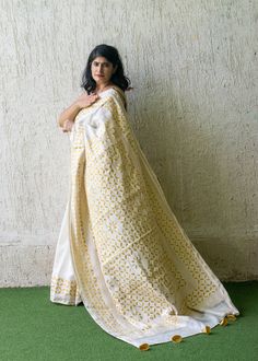 This light and airy Applique Saree is the perfect summer accessory for any wardrobe. Made of chanderi cotton silk with tissue fabric used for applique. These are made by our artisans from Barmer, India, it features exquisite hand-stitched and applique detailing, making it a stylish yet timeless piece. Perfect for a summer wedding or a party ! About Applique work~  A beautiful technique of patchwork a fabric on the base fabric. This one is slightly different from others as it used cutwork techniq Traditional Off White Chanderi Pre-draped Saree, White Cotton Silk Pre-draped Saree For Festivals, Festive Off-white Chanderi Pre-draped Saree, White Handloom Pre-draped Saree, Designer Wear Dupatta With Block Print, Festive Cotton Saree With Chikankari Embroidery, White Semi-stitched Cotton Silk Pre-draped Saree, White Cotton Silk Pre-draped Saree With Cutdana, Designer Cream Saree For Eid