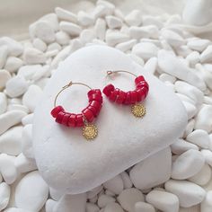 Simple, delicate and fun this hoop earrings are the perfect piece for everyday wear. ~Red Coral semi precious stones, 925 Sterling Silver sun motif ~Crafted in 925 Sterling silver with 14k gold plating ~Earring drop at 3.5cm ~Every item is handmade to order in Chania for you by me and the production time before shipping is 1-3 business days Trendy Red Nickel-free Hoop Earrings, Trendy Small Hoop Red Earrings, Trendy Small Red Hoop Earrings, Nickel-free Red Hoop Earrings, Nickel Free Red Hoop Earrings, Red Hypoallergenic Dangle Hoop Earrings, Small Red Hypoallergenic Hoop Earrings, Red Hypoallergenic Hoop Jewelry, Red Adjustable Hypoallergenic Hoop Earrings