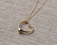 This Open Heart Necklace and chain are 14k Solid GOLD ( not filled or plated). Solid Gold Open Heart Necklace in 14k Gold, Rose Gold, White Gold. #openheartnecklace #HeartNecklace #HeartPendant #HeartCharm #zirconnecklace #heartzircon #womannecklace #goldjewelry #solidgoldnecklace #necklaceforwomen #goldpendant #romanticgifts #giftforher #goldjewelrygift #christmasgift #valentinesdaygift #romanticgifts #giftsforbestfriend #etsyjewelry #mothergift #birthdaygift Gold Sterling Silver Open Heart Necklace, Gold Sterling Silver Heart Necklace, Gold Heart Necklace For Anniversary, Gold Heart Necklace Perfect For Gifts, Gold Plated Open Heart Necklace For Mother's Day, Gold Heart Cut Necklace As Gift For Her, Gold Open Heart Necklace For Mother's Day, Gold Heart Necklace For Mother's Day, Gold Heart Detail Necklace For Gift