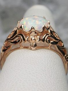 Opal ring, Rose gold over sterling silver floral filigree, daisy design #D66 Heirloom Rose Gold Opal Ring Gift, Classic Rose Gold Rings With Intricate Design, Heirloom Rose Gold Flower Ring As Promise Ring, Heirloom Rose Gold Flower Ring For Promise, Heirloom Rose Gold Flower Promise Ring, Heirloom Rose Gold Filigree Ring In 14k Gold, Ornate Rose Gold Jewelry With Intricate Design, Ornate Rose Gold Filigree Jewelry, Rose Gold Hallmarked Flower Ring For Wedding