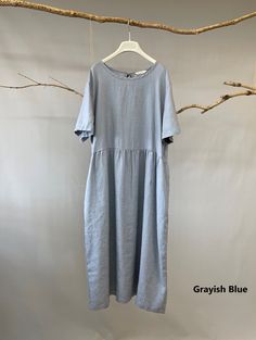 "This linen midi dress is a perfect example of beauty in simplicity. Made from breathable and soft linen, just right below the knee length, back tie at the neck line, this classic piece is such a no-brainer go to item. - Handmade with 100% medium weight linen - Short sleeves - Scoop neck - Back tie at the neckline - Below the knee length or customized length per request Please provide your shoulder width, full bust measurement ( measured around the fullest part ) and your height along with your Casual Plain Solid Linen Dress, Cotton Midi Dress With Relaxed Fit, Casual Linen Plain Dress, Relaxed Fit Solid Color Linen Dress, Casual Linen Midi Dress In Solid Color, Cotton Midi Maxi Dress In Solid Color, Knee-length Relaxed Fit Midi Dress With Pockets, Solid Color Relaxed Fit Midi Dress, Relaxed Fit Knee-length Midi Dress With Pockets