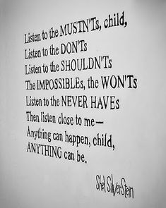 a black and white photo with words written on the wall above it that says listen to the muntts, child listen to the don't's listen to the shouldn'ts