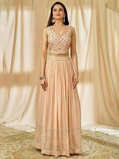 Introducing our beautiful peach thread embroidered georgette wedding lehenga choli, a stunning ensemble perfect for weddings, festivals, and special events. Crafted with the finest peach color georgette material, this lehenga features exquisite thread embroidery and sequin work, making it a true work of art.
This lehenga choli are what set it apart. The intricate thread embroidery and sequin work on the lehenga and choli add a touch of grace and elegance. The matching choli, embellished with geo Orange Georgette Sharara For Wedding, Anarkali Style Floor-length Peach Sharara, Anarkali Style Peach Floor-length Sharara, Floor-length Peach Anarkali Sharara, Orange Georgette Choli For Reception, Floor-length Peach Lehenga For Reception, Floor-length Peach Choli For Reception, Peach Floor-length Lehenga For Reception, Floor-length Anarkali Choli In Peach