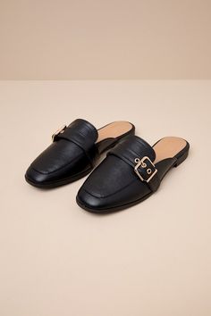 Upgrade your everyday flats with a chic new option like the Lulus Marquete Black Buckle Mule Slides! These too-cute mules have a smooth, faux leather construction that shapes an almond toe upper with a gold buckle strap and matching grommets. Classic notched collar leads to a slide-on design for effortless styling. 0. 75" rubber heel. Cushioned insole. Rubber sole has nonskid markings. Man made materials. Imported. Lulus | Marquete Black Buckle Mule Slides | Size 10. Elegant Gold Mules With Buckle Closure, Gold Mules With Buckle Closure For Spring, Spring Gold Mules With Buckle Closure, Classic Gold Mules For Spring, Trendy Flat Heel Mules With Buckle Closure, Flat Mules For Office Use In Fall, Flat Mules For Office In Fall, Elegant Flat Mules For Fall, Low Heel Mules With Buckle Closure For Work