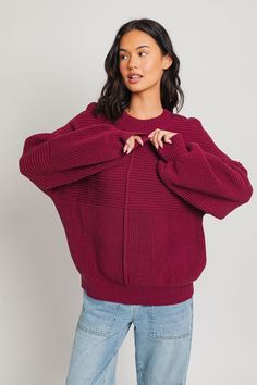 Our Ribbed Knitted Sweater is the ideal wardrobe piece for the winter season. Its banded cuffs and balloon sleeves provide fashion-forward flair, while its ribbed knit texture provides a slimming silhouette to flatter any figure. Sweater has an intentionally oversized, relaxed fit. Model is wearing a small. Recommended sizing 0-2 XS, 4-6 S, 6-8 M, 10-12 Trendy Balloons, Feminine Blouses, Knit Texture, Sweater Fits, Ribbed Knit Sweater, Women Clothing Boutique, Balloon Sleeves, Sweater Sleeves, Sheer Fabrics