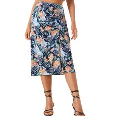 With its flowy silhouette and a high waist, this fresh-floral skirt is ready for the weekend standout. Featuring colorful tropical floral prints, it is a fun and feminine addition to any wardrobe. This tropical skirt is perfect for a beach vacation or a summer party. The model is wearing in size XS (Height: 5'9", Chest: 33 1/8 inches, Waist: 22 7/8 inches, Hip: 35 inches, Shoulder Length: 15 3/8 inches, Weight: 114.5 lbs). High Waist Ruched Skirt For The Beach, Floral Print Beach Skirt, Beach Skirted Bottoms With Floral Print, Floral Print Skirted Bottoms For Beach, Summer Floral Print Skirted Bottoms, Beachwear Floral Print Flowy Skirt, Floral Print Flowy Beachwear Skirt, Summer Tropical Print Skirt For Day Out, Summer High Waist Floral Print Skirt