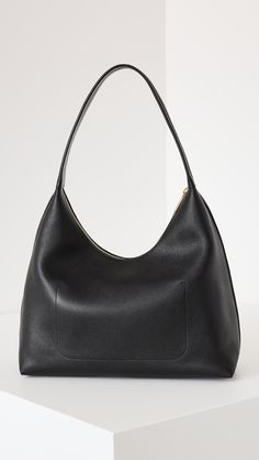 Mansur Gavriel Candy Hobo Bag | Shopbop Timeless Formal Hobo Bag With Removable Pouch, Classic Bucket Bag With Gold-tone Hardware For Formal Occasions, Chic Pouch Bag With Smooth Grain, Timeless Hobo Bag With Gold-tone Hardware For Office, Classic Formal Bucket Bag With Gold-tone Hardware, Classic Top Handle Hobo Bag For Office, Classic Smooth Grain Bucket Bag For Work, Timeless Hobo Bag With Gold-tone Hardware For Work, Smooth Grain Satchel Hobo Bag For Work