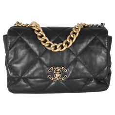 Listing Title: Chanel Black Shiny Lambskin Chanel 19 Flap Bag SKU: 133402 MSRP: 6400.00 USD Condition: Pre-owned Condition Description: A timeless classic that never goes out of style, the flap bag from Chanel dates back to 1955 and has seen a number of updates. The design was revolutionary for its time, giving its wearers the freedom to carry their everyday must-haves without the cumbersome nature of a larger bag. The bag features the classic leather-entwined chain-link shoulder strap for a dis Designer Top Handle Flap Bag With Cc Turnlock, Designer Top Handle Flap Bag With Cc Turnlock Closure, Luxury Double Flap Bag, Designer Rectangular Flap Bag With Cc Turnlock Closure, Luxury Business Shoulder Bag With Cc Turnlock Closure, Luxury Rectangular Flap Bag, Luxury Evening Flap Bag With Cc Turnlock Closure, High-end Top Handle Bag With Cc Turnlock Closure, High-end Rectangular Shoulder Bag With Cc Turnlock