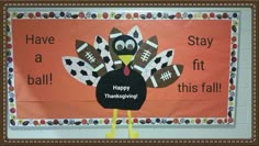 a bulletin board with a turkey and footballs on it that says, have a ball stay fit this fall