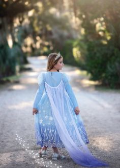 One of our most adorable Ice Queen costumes, this dress will not disappoint! The sequin bodice has a sheer sleeve, finished off with puff shoulders and sweet trim. This dress is a real gown and not a cheap plastic costume. We are never itchy and never use glitter! A tremendous value for such cuteness. Fully lined, elastic waist and back button. Machine wash, hang dry. Ice Princess Costume Kids, Princess Dress Kids Fabulous Bargains Galore, Princess Elsa Dress Kids, Aurora Sleeping Beauty Dress Kids, Ice Queen Costume, Elsa Dress For Kids Walmart, Dog Size Chart, Queen Costume, Ice Queen