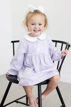 The Purple Stripe Riley Dress is a delightful choice for playtime during cooler weather! Designed with comfort in mind, this long sleeve knit dress is not only perfect for school and playtime but also transitions seamlessly for various occasions. Purple and white soft knit stripes and a white Peter Pan collar with purple picot trim. Elevate its charm by adding a monogram, making it uniquely adorable. Playful Long Sleeve Playwear Dresses, Playful Long Sleeve Dresses For Playwear, Preppy Long Sleeve Dresses For Fall, Preppy Long Sleeve Spring Dresses, Spring Long Sleeve Dresses For Playtime, Long Sleeve Dresses For Playtime In Spring, Long Sleeve Dresses For Spring Playtime, Cute Long Sleeve Sweater Dress For Fall, Playful Long Sleeve Dresses For Fall