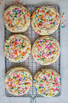 sprinkle covered cookies on a cooling rack