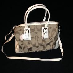 Coach Hampton Signature Satchel In Brown/Khaki/White. Brand New. Bag Has Brown Signature "C"S All Over, With A White Patent Leather Trim. Comes With Long Shoulder Strap. Ahthentic. Purchased From The Coach Store. **Open To Offers!!** White Designer Bag With Top Carry Handle, White Designer Bags With Top Carry Handle, White Bag With Double Top Carry Handle, White Crossbody Shoulder Bag With Silver-tone Hardware, White Satchel Shoulder Bag With Handles, White Bags With Top Carry Handle For Errands, White Bags For Errands With Top Carry Handle, White Satchel With Adjustable Strap, White Shoulder Bag With Silver-tone Hardware And Double Handle