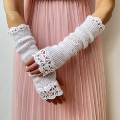 Long fingerless white arm warmers, gently knitted and crochet in light weight wool/acrylic yarn. Bridal fingerless gloves, Wedding fingerless mittens, Womens long gloves, Valentines Gift Ideas, Gift for Her, Girlfriend, Wife Graceful and delicate, these gloves are inspired from the pure first love ... And it's the perfect gift for your beloved or ... your wedding :) Crochet edges and color shades make them feminine and chic, and they are long enough and warm to be practical and wearable. Created Fitted White Crochet Knitting Pattern, Fitted White Knit Knitting Pattern, Winter White Crochet Knitting Pattern, Fitted White Hand-knitted Pattern, One Size White Crochet Knitting Pattern, Fitted White Hand Knitted Pattern, White One-size Knitting Pattern, White Knit Leg Warmers, White Hand Knitted Fitted Knitting Pattern