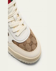 Gucci lowtop sneakers in leather and GG canvas with signature web strap accent    Flat heel    Round toe    Laceup vamp     Cushioned footbed    Lining: Leather    Rubber outsole    Made in Italy Bergdorf Goodman, Leather Sneakers, Low Top, Tops Designs, In Italy, Lace Up, Gucci, Italy, Luxury Fashion