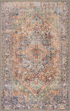 an orange and blue area rug with ornate design