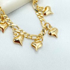 18k Gold Filled Bracelet, 3mm Figaro Chain Link with Cute Puffed Dangle Hearts Shape Charms Bracelet, Wholesale Price Jewelry Bracelet Size: - Length: 8 Inches | Thickness: 3mm     💎 With new products daily, quality and competitive prices, in DiJu Jewelry you find the most unique styles of modern designs, always looking for elegance and market trends. *Helping your Jewelry Businesses Grow *Starting your Own Business *Making your Own Collection: DiJu Jewelry ever brings Better Moments for your Life. 📲 Find many more styles in our DiJu Jewelry Etsy Store. https://www.etsy.com/shop/DJDiJuJewelry 💎 You can choose from unique styles of earrings, necklaces, pendants and charms, bracelets, anklets, rings, chokers, and many others. On the off chance that you can't locate a particular style here Gold Dangle Charm Bracelet With Heart Charm, Gold Dangle Heart Charm Bracelet, Gold Charm Bracelet With Heart Beads For Valentine's Day, Hearts Bracelet, Figaro Chains, Charms Bracelet, Figaro Chain, Market Trends, Solid Gold Jewelry