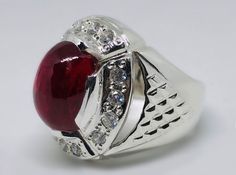 Women Quality Cabochon Red Ruby Yaqoot Sterling Silver 925 Handmade Ring Product Type: Ring Ring Size: 5 US, 6 US, 7 US, 8 US, 9 US, 10 US, 11 US, 12 US, 13 US, 14 US, 15 US, 16 US Stone Type: Ruby, Yaqoot, Rubin, Yaqut, Rubis, Roby Metal Type: Sterling Silver 925 Main Stone: Ruby Main Stone Color: Red Handmade: Yes, Artisan Ring Type: Heated & Treated (Lab Created) This Sterling Silver Ring is a perfect gift for men and women. The ring showcases an elegant design with unique Ruby stone. Get it Ruby Cabochon Round Jewelry, Unique Cabochon Ruby Ring For Formal Occasions, Luxury Silver Ruby Cabochon Ring, Elegant Red Dome Ring For Anniversary, Elegant Red Dome Ring For Formal Occasions, Traditional Red Rings For Anniversary, Red Jewelry With Accent Stones For Formal Occasions, Silver Ruby Round Jewelry, Red Round Jewelry With Accent Stones