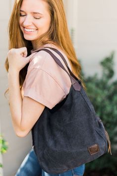 our anniston hobo bag is as cute as it is functional. the slouchy look pairs perfectly with some amazing qualities to help you store and easily access all of your daily essentials. it comes with two magnetic-snap compartments on top on each side of the main zipper-enclosed compartment. this makes it a breeze to throw in your phone or keys that you might need quick and easy access to, while still being able to zip up your wallet or cash in a more concealed and safe compartment. you're going to lo Canvas Hobo Bag, Longchamp Le Pliage Backpack, Daily Essentials, Modern Chic, Chic Boutique, Green Bag, Hobo Bag, Leather Handle, Easy Access