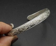 "Vintage silver tone Chinese style cuff, In good vintage condition. Measures 2\" ¾ x 2\" ¼ ( out side edge to edge ). 2\" 5/8 x 2\" ( In side edge ) and 8 mm thick. Thanks." Nickel Free Silver Cuff Bangle, Silver Stamped Cuff Bracelet, Silver Metal Cuff Bracelet For Anniversary, Silver Stamped Cuff Bracelet For Wedding, Formal Etched Silver Cuff Bracelet, Formal Silver Etched Cuff Bracelet, Vintage Silver Cuff Bangle, Nickel Free Silver Cuff Bracelet, Adjustable Etched Silver Cuff Bracelet