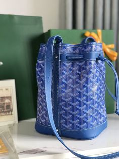 Goyard Petit Flot bucket bag, fortune bucket, capacity Max⌛️
The fabric is made of custom-made double-layer thickened rain linen with linen, hemp fiber and cotton as the main components ✅ Custom-made leather pattern ✅ One shoulder strap can be adjusted to multiple lengths, and it can be carried on one shoulder and crossbody️For other details Figure 
size: 14*16*22cm Designer Bucket Bag With Leather Handles, Designer Coated Canvas Bucket Bag For Daily Use, Luxury Blue Bucket Bag, Luxury Blue Shoulder Bucket Bag, Designer Everyday Bucket Bag, Designer Blue Rectangular Bucket Bag, Luxury Blue Bucket Bag For Shopping, Luxury Blue Bucket Bag For Daily Use, Luxury Blue Canvas Bag