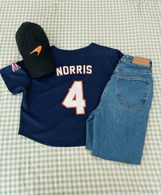 mclaren lando norris outfit Lando Norris Style, Silverstone F1 Outfits, Mclaren Outfit Ideas, F1 Merch Outfit, Lando Norris Outfit, Mclaren F1 Outfit, F1 Outfit For Women Mclaren, Mclaren Outfit, Paddock Fashion