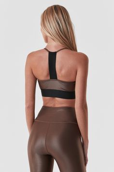 Supportive, sporty, and stylish - meet the Liquid Studio Bra. A scoop neckline and sporty elastic back create the perfect balance between chic and athletic. Now available in Cafe, a beautiful mid-tone brown gloss. This item is final sale Scoop Neckline, Final Sale, Cafe, Elastic, Bra