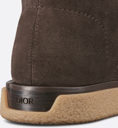 New for Spring 2025, the Dior Sahara chukka boot offers a new take on a timeless style with the House's couture codes. The chunky silhouette is distinguished by a luxurious and ultrasoft deep brown suede upper and tonal mohair laces. The contemporary shoe is completed by a sole in beige crepe-effect rubber and brown leather with an engraved signature on the heel. The chukka boot will add the finishing touch to any of the season's casual looks.. 39 Contemporary Shoe, Chukka Boot, Deep Brown, Look Casual, Brown Suede, Chukka Boots, Casual Looks, Timeless Fashion, Brown Leather