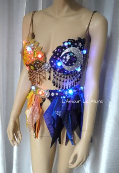 a mannequin wearing a bra with lights on it