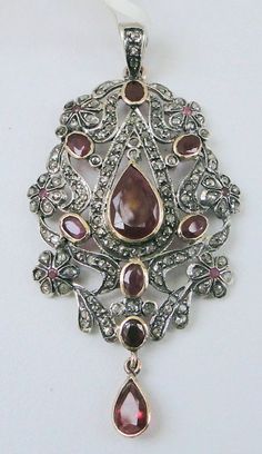 Item-vintage victorian style rose cut diamond and ruby gemstone pendant. total weight-9 grams, weight of rubies-12 carat, old cut flat round diamond weight-3.70 ct, 14 ct gold weight-6.300 gms, size of pendant-6/3.4 cm, Victorian Ruby Necklace For Formal Occasions, Antique Yellow Gold Jewelry With Rose Cut Diamonds, Vintage Diamond Gemstone Necklace, Ornate Rose Cut Diamond Pendant Jewelry, Vintage Diamond Necklace With Gemstones, Vintage Diamond Necklace With Rose Cut Diamonds, Vintage Rose Cut Diamond Necklace, Victorian Ruby Pendant Jewelry, Traditional Rose Cut Diamond Pendant Necklace