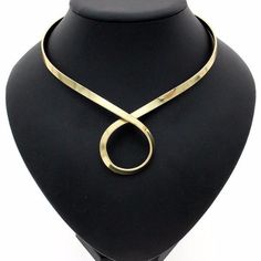 Golden Loop Torque Necklace Collar Necklace Gold, Necklace Collar, Formal Brass Clavicle Chain Jewelry, Modern Luxury Metal Necklaces, Elegant Party Necklaces Nickel Free, Elegant Party Necklace Nickel Free, Metal Collar Necklace, Formal Metal Choker With Clavicle Chain, Gold Alloy Necklaces For Party