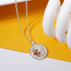 This pendant offers a keepsake that caters to several special occasions! A photo and initials you want on the front plus a space on the reverse side for a personalized text engraving! With your choice of length on a 16", 18" and 20" Perfect for newlywed photos, children, any couple, and family. The back can be engraved with a personalized message. The photo is scratch and water-resistant and comes with a lifetime warranty. NECKLACE INFORMATION SKU: JNCY103629 Metal type and color: Sterling Silve Silver Medallion Necklace For Anniversary Gift, Custom Engraved Necklace For Anniversary On Valentine's Day, Personalized Medallion Locket Necklace For Mother's Day, Mother's Day White Gold Locket Necklace, Valentine's Day Engraved Custom Necklace For Anniversary, Mother's Day Personalized Medallion Locket Necklace, Valentine's Day Pendant Necklaces With Engraving Option, Silver Locket Necklace For Memorial On Mother's Day, Silver Locket Necklace For Mother's Day Memorial