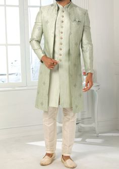 Readymade Art Silk Sherwani, and Jacket. Art Dupion Aligarhi Ready Made Trouser. Resham, Sequences, and Zari Work. Crafted in Chinese Collar Neck, and Full Sleeve. Faux Satin Lining with Plain Work. High-Quality Matching Buttons. Please Note: The footwear shown in the picture is for presentation and photography purpose only. Color: There might be slight color variation due to lightings and flashes while photo shooting. The color may also vary because of different screen resolutions. Wash Care: D Indo Western Outfits For Men Engagement, Party Wear Dress For Man, Western Outfit Men, Marriage Dress For Men, Indo Western Outfits For Men, Indian Wedding Dress Modern, Indo Western Dress For Men, Western Party Wear, Indian Groom Dress