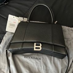 Authentic Balenciaga Hourglass Bag Size Small. New, Never Worn. Grain Leather With Silver Hardware. Comes With Dust Bag And Tags Balenciaga Mini City, Balenciaga Hourglass Bag, Balenciaga Purse, Hourglass Bag, Glass Bag, Balenciaga Wallet, Balenciaga Tote, Crocodile Purse, Mini Hand Bag