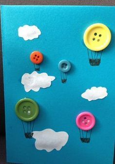 a card with buttons and clouds on it