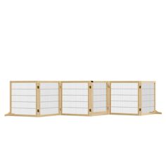 a wooden and wire partition with four sections on each side, one section open to show the