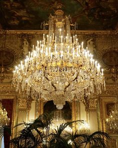 a large chandelier hanging from the ceiling in a room