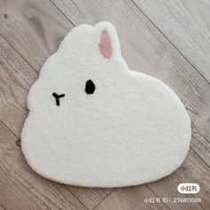 an animal shaped rug on the floor