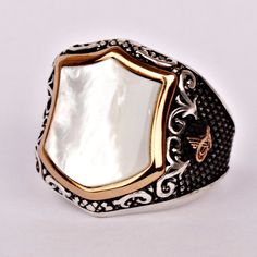 Men's mother of Pearl gemstone signet ring which will give you a head turning presence. This mystic, vintage style, engraved ring has a unique design for the polished, refined, and distinguished man. Perfect for casual and formal events, it will make your friends envious as you walk into the room full of confidence and pride. Looking for a unique, one of a kind GIFT FOR HIM, groomsman gift, father's day gift, teacher day gift? Look no further. This cool gemstone ring is the right answer and best Gemstone Wedding Band, Pearl Anniversary, Cool Rings For Men, Goth Bands, Gemstone Wedding, Groomsman Gift, Teachers Day Gifts, Masonic Ring, Engraved Ring