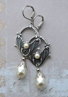 VINTAGE ELEMENTS Unique Jewellery, Handmade from Vintage Inspired Original Designs Art Nouveau style antiqued silver plated brass Floral Bridal Earrings  with Cream Crystal Pearls and corresponding Glass Cabochon detail. These earrings have antiqued brass leverback earwires and measure 6.3cm from the top of the earwires. Ornate Antique Silver Nickel-free Jewelry, Handmade Silver Jewelry For Vintage Events, Vintage Silver Dangle Bridal Earrings, Vintage Silver Bridal Earrings For Formal Occasions, Silver Vintage Bridal Earrings For Formal Occasions, Antique Silver Vintage Dangle Jewelry, Antique Silver Vintage Drop Earrings, Vintage Antique Silver Dangle Earrings, Vintage Antique Silver Dangle Jewelry