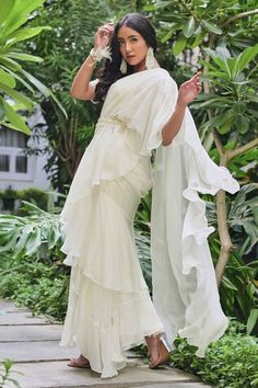 Off-white pre-draped saree with ruffle border. Paired with pearl embroidered blouse and belt. - Aza Fashions Ruffle Sarees, Draped Saree, Ruffle Saree, Drape Saree, Saree With Blouse, Neck Ruffle, Embroidered Blouse, White Pearl, Aza Fashion