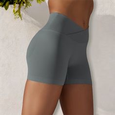 The Anna-Kaci Women's High Waist Seamless Ribbed Biker Shorts are a stylish and functional addition to your activewear collection. Made from soft, stretchy ribbed fabric, these biker shorts feature a high waist design that provides excellent support and a flattering fit. The seamless construction ensures maximum comfort and freedom of movement, making them perfect for workouts, yoga sessions, or casual wear. Pair these versatile shorts with a crop top, sports bra, or oversized tee for a chic and Gray High Stretch Athletic Shorts For Yoga, Gray Stretch Biker Shorts For Sports, Functional Solid Color Seamless Shorts, Solid Stretch Seamless Biker Shorts, Compressive Shapewear Biker Shorts For Workout, High Stretch Gray Shorts For Sports, Gray Compression Biker Shorts For Yoga, Gray Stretch Athletic Shorts For Yoga, Gray High Stretch Sports Shorts