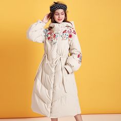 Flower Embroidery Hooded Long Puffer Jacket - 176.96 Fall Beige Outerwear With Floral Embroidery, Beige Floral Embroidered Outerwear For Fall, Spring Cotton Hooded Jacket For Cold Weather, Cotton Hooded Jacket For Cold Spring Weather, White Embroidered Hooded Outerwear, Spring Cold Weather Hooded Jacket With Drawstring, Spring Hooded Jacket With Drawstring For Cold Weather, Beige Hooded Jacket For Spring Cold Weather, Spring Cotton Hooded Long Jacket