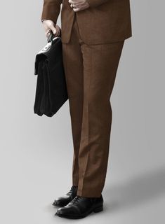 Devise a modish style statement by wearing our Huddersfield Stretch Brown Wool Pants, ensuring you stay at the forefront of style. Exquisitely fashioned from a wool blend fabric, this ensemble boasts an earthy brown tone, meticulously dyed into a solid texture, adding an undeniable poise and flair to your look, allowing you to confidently wear it to various occasions, such as parties, receptions, weekend meetings, and even on workdays. 
  Introducing "Voyager" collection, a truly exceptional fabric that combines luxury and performance. Crafted from super 100's australian merino wool fiber with touch of lycra for flexibility and resillience is enriched with prunelle weave that ensures a lively draping and crease resistance feature. 
  Look Includes     Huddersfield   Stretch   Brown   Wool Fitted Brown Business Bottoms, Fitted Brown Bottoms For Business, Brown Dress Pants For Business Casual In Fall, Brown Dress Pants For Business Casual Fall Season, Semi-formal Brown Bottoms For Fall, Fall Season Brown Business Casual Dress Pants, Brown Semi-formal Fall Bottoms, Brown Bottoms For Semi-formal Fall Occasions, Brown Wool Pants For Business Casual