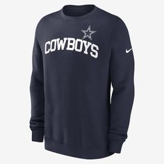 The Club Crew brings a traditional look to your Dallas Cowboys wardrobe. It features a soft fleece lining to help keep you warm and team details for a game-day aesthetic. Winter Team Spirit Crew Neck Sweater, Winter Crew Neck Sweater With Team Spirit Style, Winter Fleece Sweatshirt For Fan Gear, Collegiate Sweater For Game Day In Winter, Varsity Fleece Sweater For Winter, Winter Sweater With Ribbed Cuffs For Sports, Winter Sweater With Ribbed Cuffs, Winter Fleece Tops For Sports Fans, Navy Winter Sweater For College