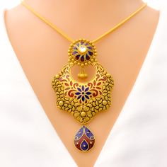 Make a statement with our Iconic Floral Meenakari Pendant Set. Crafted from 22k gold with an oxidized finish, this set boasts intricate meenakari work and stunning kundan stones. The pendant measures 2.9" in length, while the matching earrings are 2.25" long, both with screw back posts. With a weight of 39.9 grams, this set is a must-have for any fashion-forward individual. PRODUCT DETAILS Gold Purity(karat): 22k Item Weight(grams): 39.9 Item Finish: Oxidized Stone: Kundan Pendant Length: 2.9" M Ceremonial Meenakari Temple Necklace For Diwali, Gold Pendant Set, 22k Gold, Pendant Set, Matching Earrings, Gold Pendant, Post Earrings, Screw, Fashion Forward