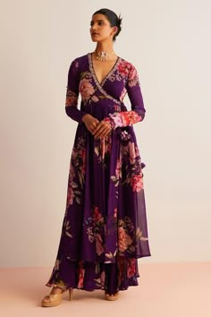 Purple full sleeve angrakha anarkali with floral print and tassel detailing. Paired with a gathered floral print pant.
Components: 2
Pattern: Print
Type Of Work: Floral
Neckline: V Neck
Sleeve Type: Full Sleeves
Fabric: Viscose Georgette
Color: Purple
Other Details: 
Model height:  5 ft 9 inches, wearing size S
Length:
Angrakha Length - 50 inches
Pant Length - 42 inches
Occasion: Sangeet - Aza Fashions Kurti Full Sleeves Design, Angrakha Style Anarkali, Angrakha Anarkali, Angrakha Dress, Designer Anarkali Dresses, Angrakha Style, Trendy Outfits Indian, Dresses Traditional, Anarkali Dress Pattern