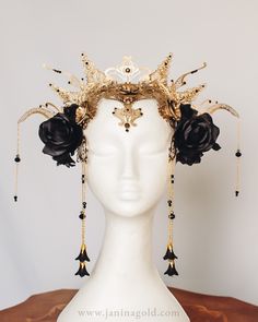 Unleash your inner dark queen with this opulent golden headpiece, featuring intricate filigree designs and bold black roses. Perfect for Halloween, masquerades, or fantasy-inspired events, this handcrafted accessory is both regal and dramatic. The delicate gold chains with black beads and dangling flower-shaped charms add a luxurious touch to this one-of-a-kind piece. Whether you're dressing as gothic royalty or a dark sorceress, this stunning headpiece will ensure you make an unforgettable entrance. Perfect for anyone seeking a unique, high-end costume accessory. Gothic Royalty, Black And Golden Dress, Golden Headpiece, Dark Sorceress, Bee Outfit, Black Flower Crown, Dark Royalty, Fantasy Crown, Gothic Crown