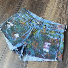 Nwot Brand New Never Worn Levi’s Furst Of S King 6 Missy Shorty Shorts! Artsy Painted Floral Like Print All Over Amazing And On Trend! Waist 15” Across Rise 9” Inseam 2” Multicolor Cutoff Shorts For Spring, Spring Multicolor Cutoff Shorts, Multicolor Cutoff Jean Shorts For Summer, Multicolor Cotton Cutoff Bottoms, Multicolor Short Length Jean Shorts For Summer, Levi's Blue Jean Shorts For Summer, Levi's Fitted Blue Jean Shorts, Fitted Levi's Blue Jean Shorts, Levi's High-waisted Blue Jean Shorts