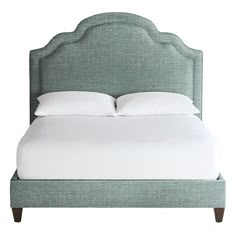 the headboard and foot board of a bed with white sheets on it, against a white background